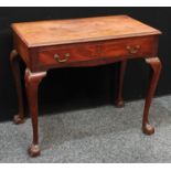 A George II mahogany side table, moulded rectangular top above a long frieze drawer, brass Rococo