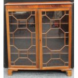 A George III style mahogany astragal glazed bookcase. 119cm high.