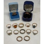 A 9ct gold eterninty ring set with diamond chips; other 9ct gold dress rings, some set with