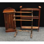 A Victorian walnut pot cupboard c1890; A Edwardian mahogany towel rail; Another(3)