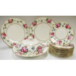 An English ceramic muffin dish by Collingwoods Brothers, Longton, twelve side plates and two sandwic