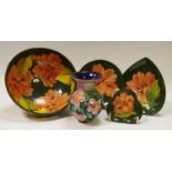 Moorcroft Hibiscus pattern bowl; heart shaped trinket box, two other dishes; an Old Tupton