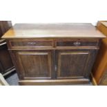 A Victorian mahogany sideboard moulded top, two short drawers over two door cupboard, plinth