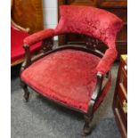 A Victorian mahogany tub chair, scrolling padded back, padded arms and seat, French cabriole