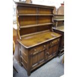 An Ercol dresser. 161cm high x 122cm wide x 48cm deep.