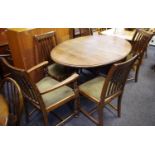 An early 20th century oak barley twist gateleg table, four dining chairs and a carver. (6)