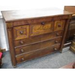 A Victorian mahogany Scottish chest, oversailing top, secret drawer over three short and three