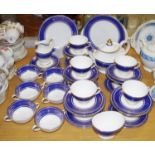A Royal Doulton Royal Windsor pattern part tea service for ten comprising teacups, saucers, side
