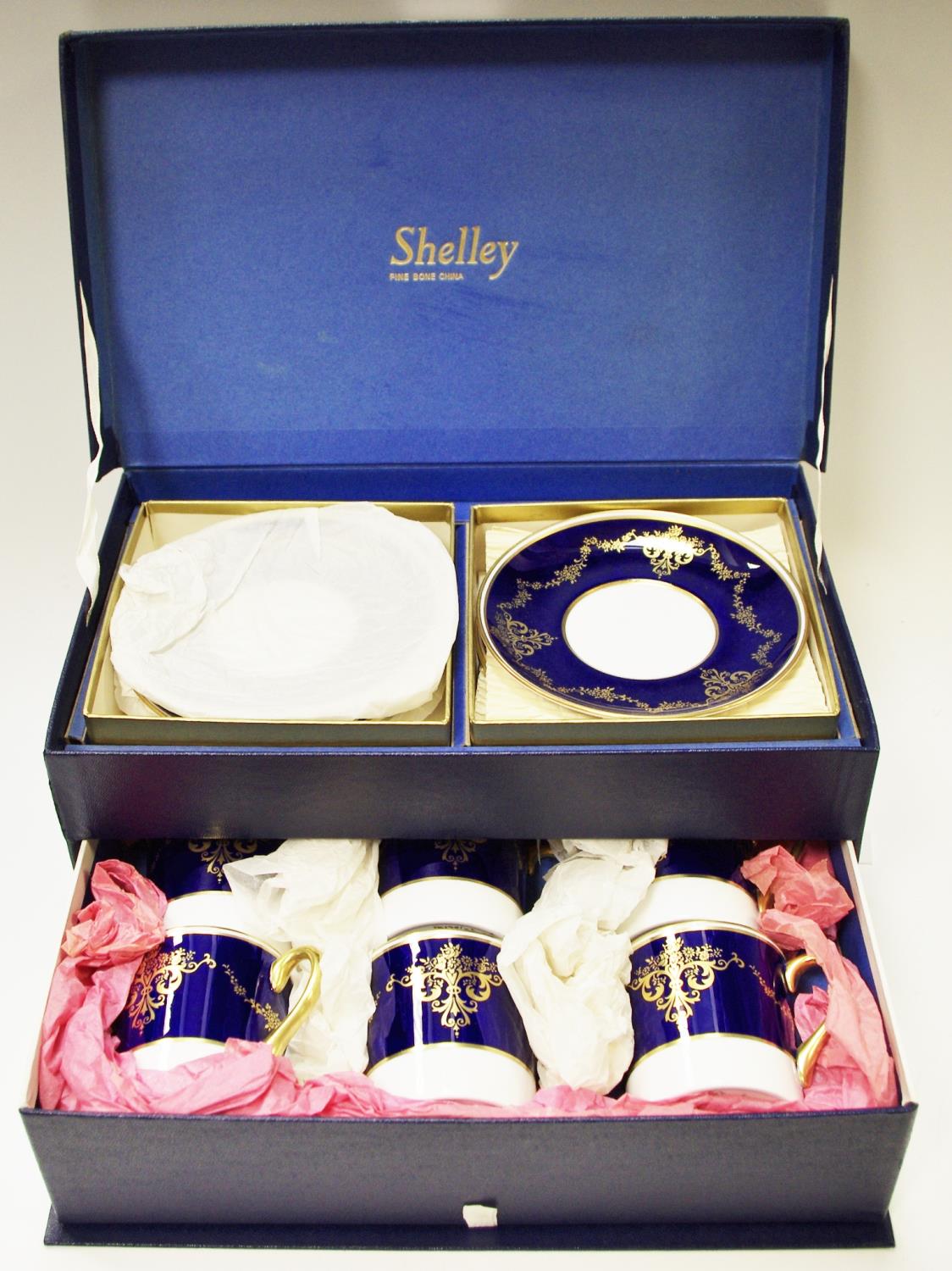 A Shelley coffee set for six comprising cans and saucers in original box