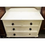 A Victorian painted pine chest of two short drawers over two long.