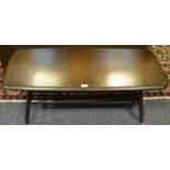 An Ercol coffee table, rounded rectangular top, spindled undertier 36cm high x 46cm wide x 105cm