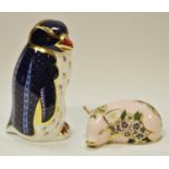 A Royal Crown Derby limited edition paperweight, Rock Hopper Penguin; another Plumbstead Piglet,