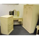 A Rococo style bedroom suite comprising double wardrobe, kidney shaped dressing table with