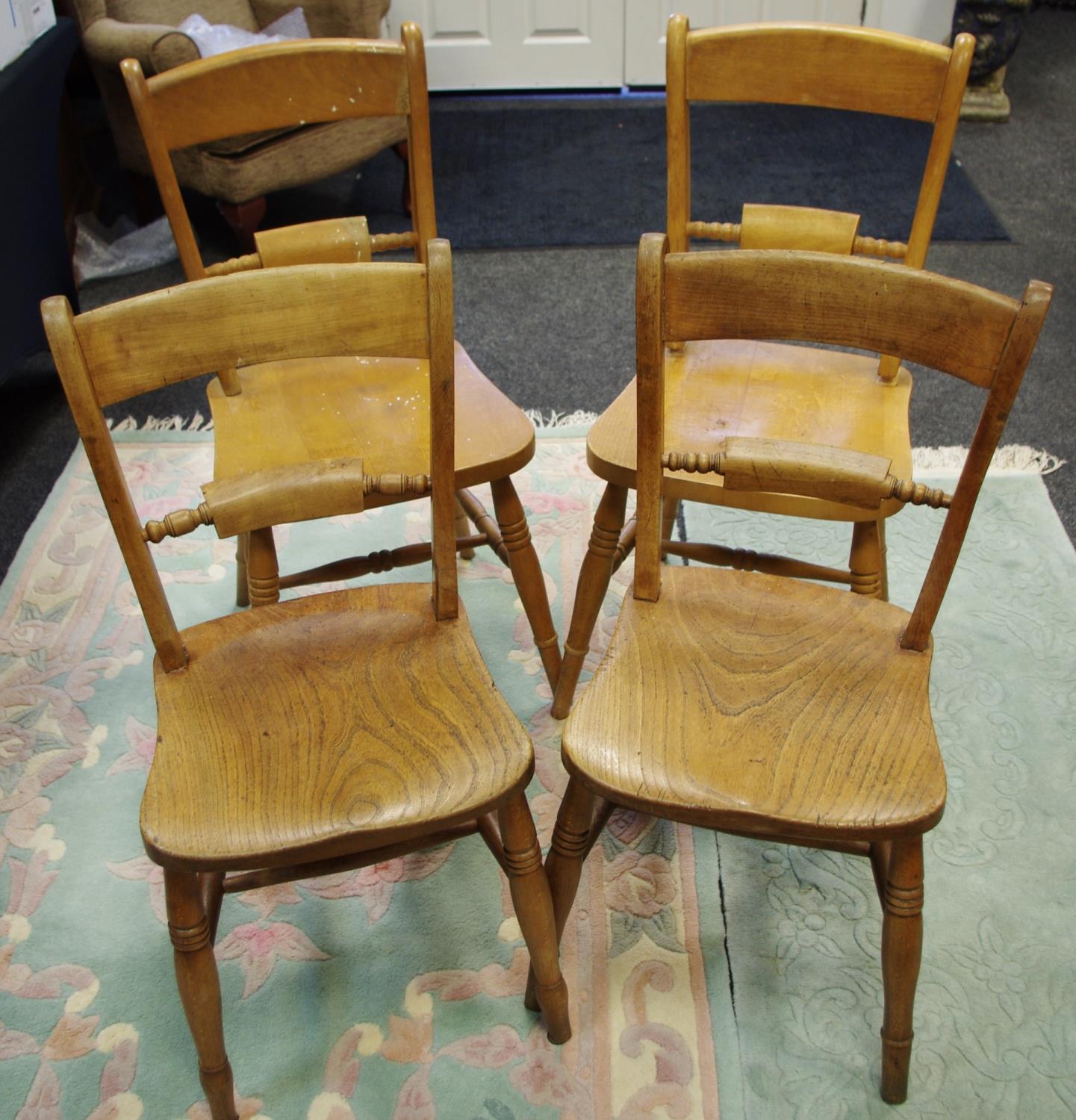 A pair of Victorian bar back kitchen chairs; two similar, later chairs. (4)