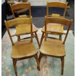 A pair of Victorian bar back kitchen chairs; two similar, later chairs. (4)