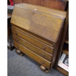 A 1940's oak bureau.