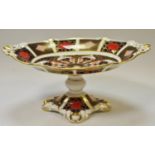A Royal Crown Derby 1128 Imari oval comport, shaped top, acorn pierced end tips, printed marks