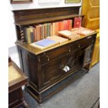 A Jacobean revival oak sideboard, carved gallery and shelf to top, barley twist supports, two long