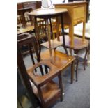 An Edwardian mahogany octagonal occasional table; a George III wash stand; a plant stand; two