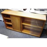 A retro Rosebury Unit Furniture bookcase with sliding glass and wooden doors.