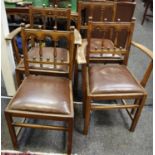 Four carved Ercol style dining chairs including two carvers. (4)