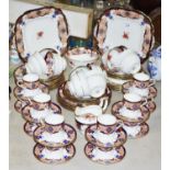 An Aynsley A3801 part tea and coffee set comprising cups and saucers, milk,sugar, cake plates, tea