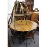 An Ercol dropleaf dining table, four low back dining chairs and two high back dining chairs (7)