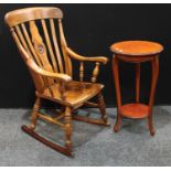 A country house 20th century oak rocking chair; Another occasional table.(2)