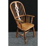 A Windsor armchair, pierced Christmas tree slat, h-stretcher