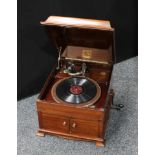 An HMV table top wind up gramophone, mahogany case, 40.5cm wide