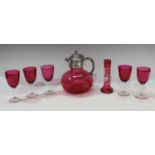 A Cranberry glass EPNS mounted claret jug, five cranberry glass drinking glasses; a Mary Gregory