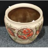 A large late 19th century Langley Ware jardiniere, decorated with red poppies with foliage on a