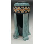 A continental Art Deco bullet shaped umbrella/stick stand, applied with a band of arrow motifs,
