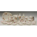A Royal Crown Derby Posie pattern mantel clock, pair of ginger jars, jugs, cups and saucers,