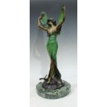 An Art Nouveau style bronze, Libertine, 48cm high, circular marble base