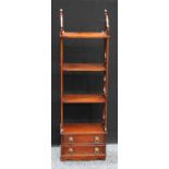 A 20th century mahogany whatnot shelve unit, three tire shelves above two short drawers. 112cm high.