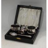 Silver - a boiled egg set, spoon and egg cup, Birmingham 1961, cased; an oval napkin ring; another