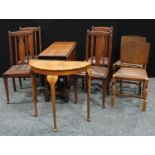 An oak gateleg table, a set of four oak dining chairs; another pair of chairs; a demilune side