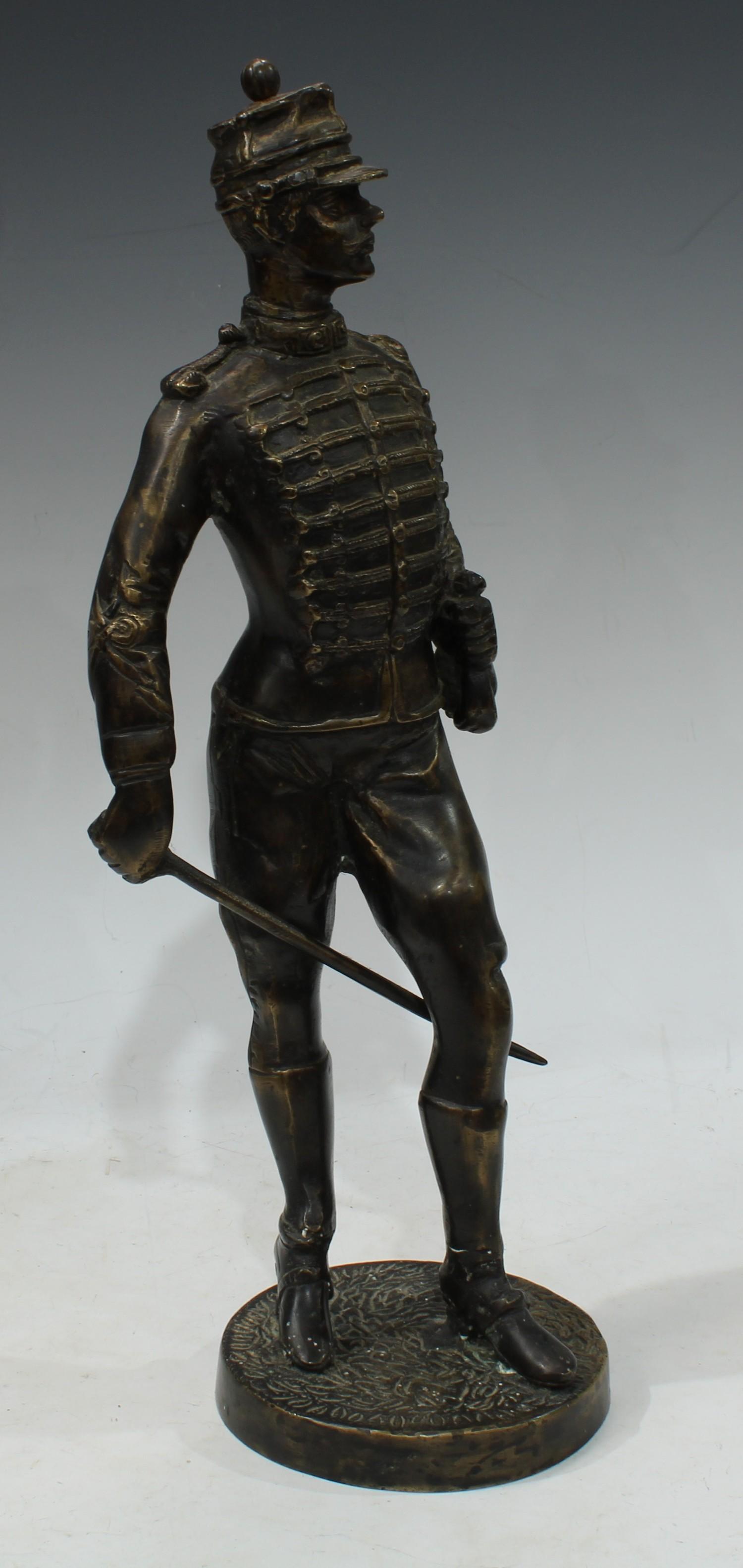 A dark patinated bronze, of an infantry solider in uniform, circular base, 39cm high - Image 2 of 2