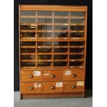 Industrial Salvage - an early 20th century haberdashery shop display cabinet, two rows of sliding