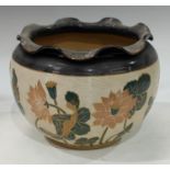 A late 19th century Langley Ware jardiniere, incised decoration with flowers in tones of pink and