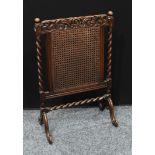 A mid 20th century oak fire screen, 86.5cm high.