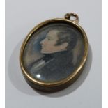 An oval portrait miniature pendant, Gentleman, 2.5cm