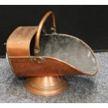 A copper coal scuttle, swing handle, 45cm wide