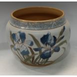 A Langley Ware jardiniere, incised decoration with iris in tones of blue and green, highlighted with
