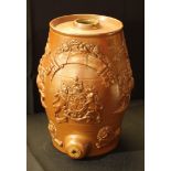 A 19th century salt glaze stoneware spirit barrel, coat of arms and knight sprigs, 29cm high