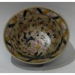 A Chinese circular celadon type glazed bowl, painted with lotus flowers, character mark, 17cm