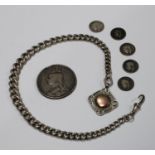 A Victorian silver graduated Albert chain with silver fob, 48.5g; a silver crown coin, 1889; five