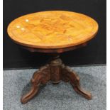 A late 19th century parquetry tripod table of small proportions, circular top inlaid with a star