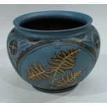 A late 19th century Langley Ware jardiniere, incised decoration on a blue ground, impressed marks to